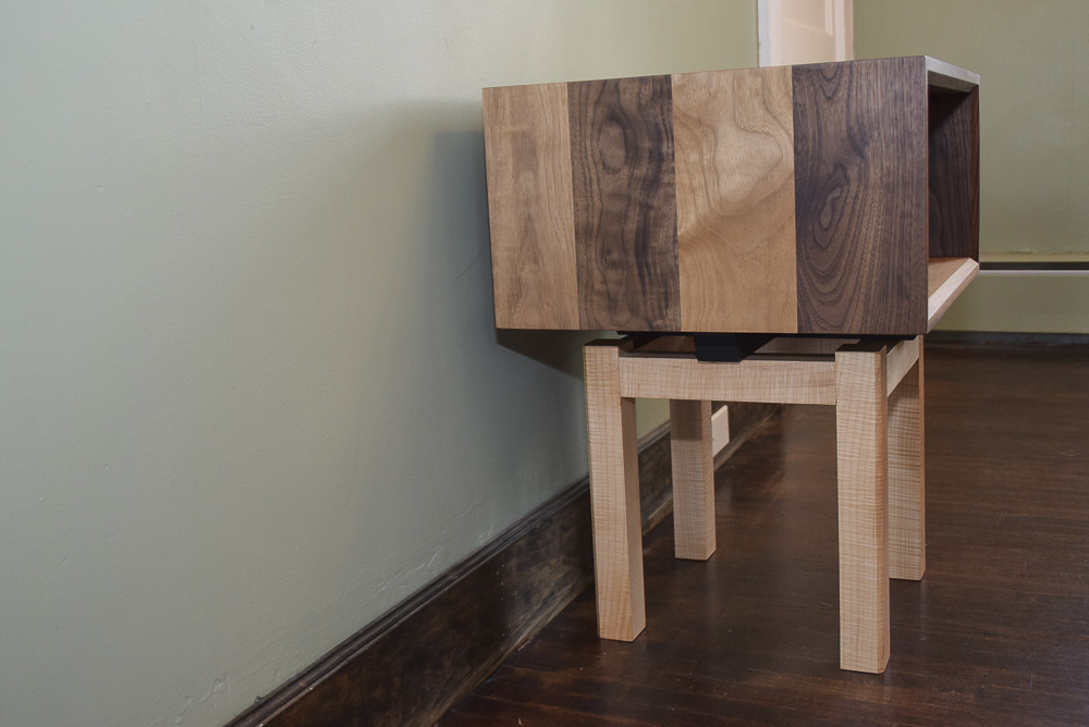 side view of the walnut and maple open end table
