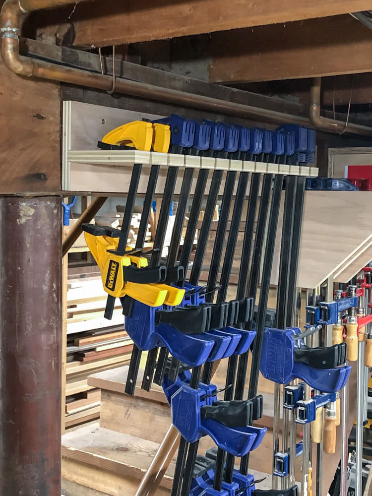 quick clamps installed in the oak plywood quick clamp rack