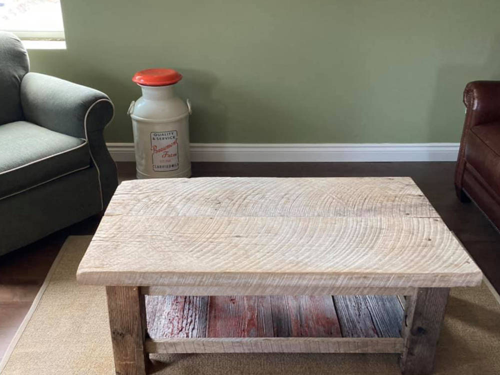 custom furniture. heavily weathered reclaimed barn wood coffee table with saw marks