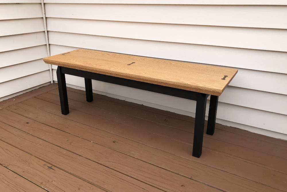 Repurposed oak chamfer coffee table with black base