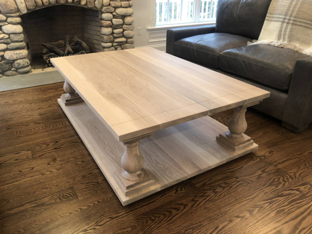 custom furniture. rectangular white oak coffee table with turned pedestal legs